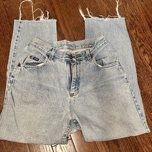 Vintage Lee Jeans with distressed hem and butt rip  B